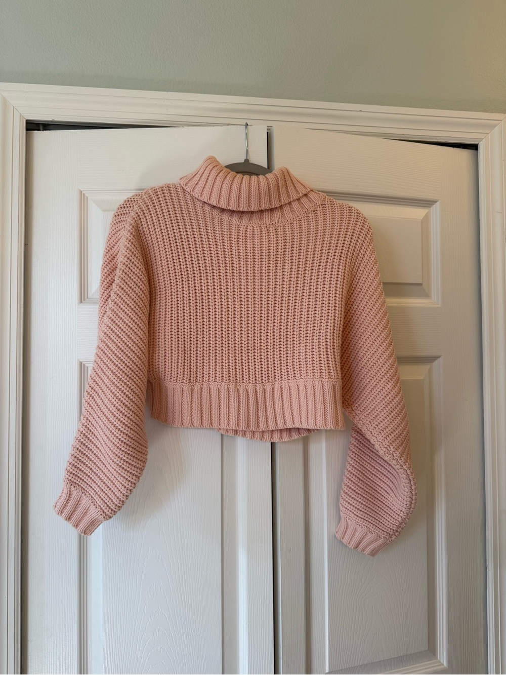 Undra Celeste New York pink cropped sweater